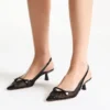 Amita 45 Escarpins à bride arrière en cuir verni noir et maille