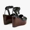 Jori 100 : cuir de veau noir brillant et talons compensés en liège brillant